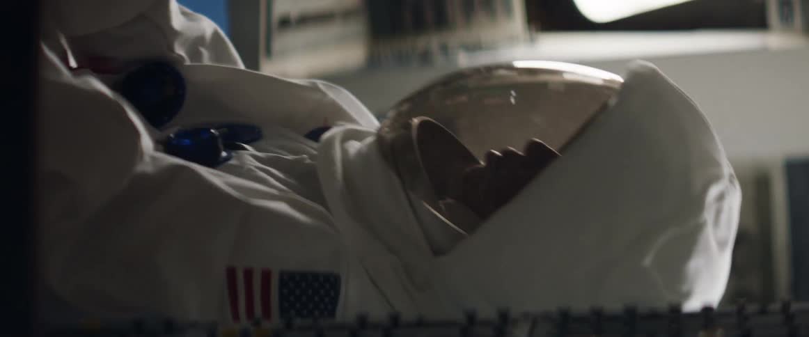 An astronaut holds on tight as their aircraft shakes rapidly