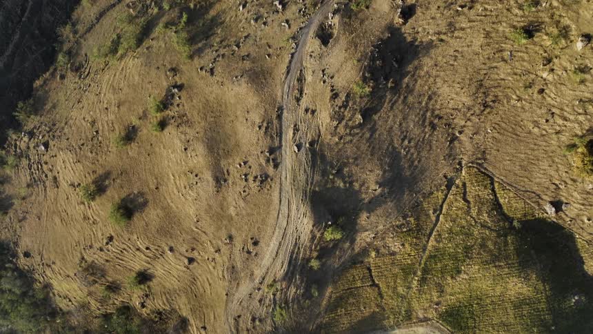 A trail runs over the hills