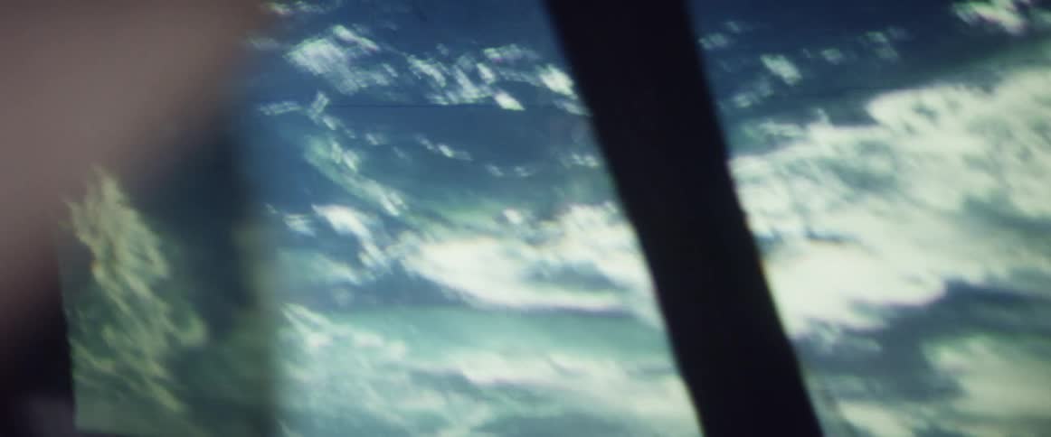 The ship shakes as it flies above earth