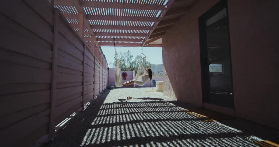 A woman is resting in a hammock