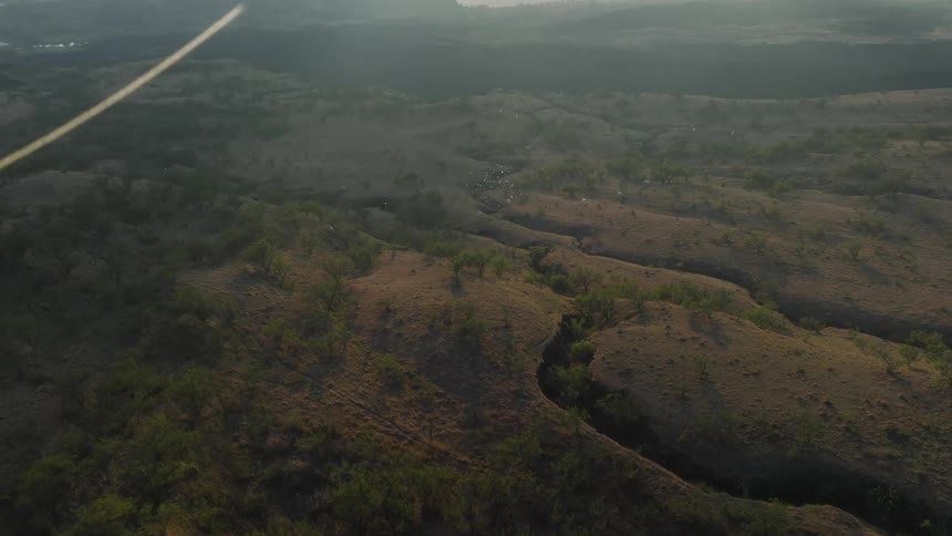 The fog floats over the valley