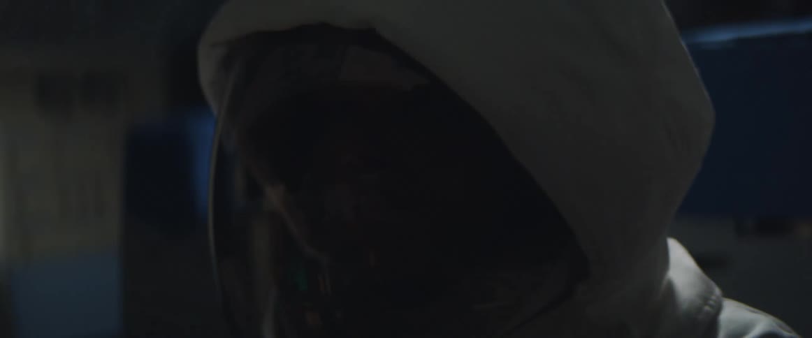 The astronaut sits in the shaking cockpit