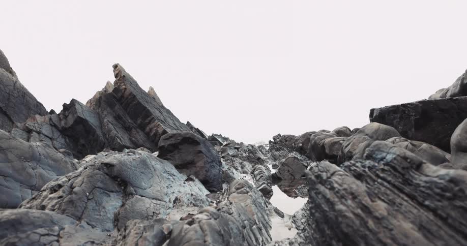 Snow settles between ridges in a canyon