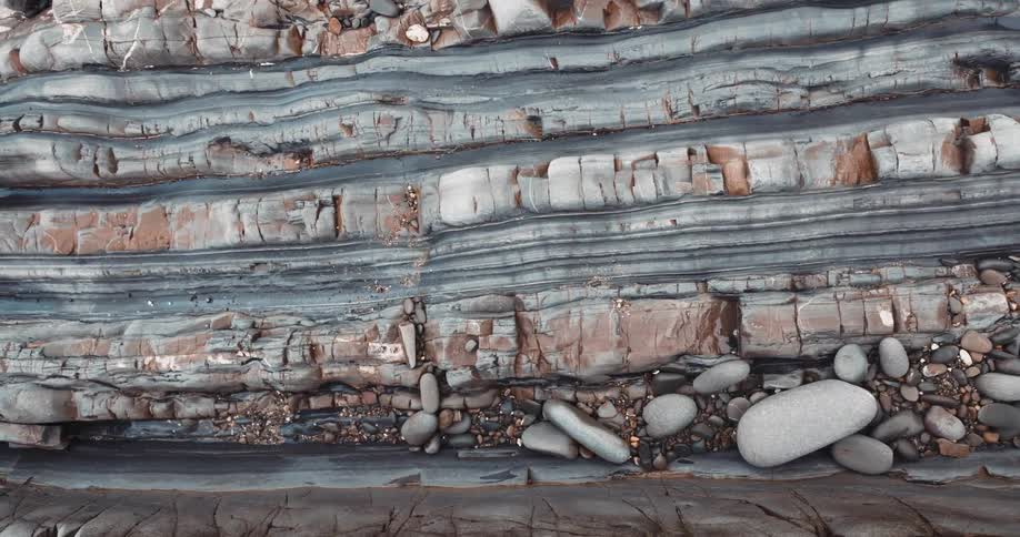 The stone quarry is full of boulders and slate
