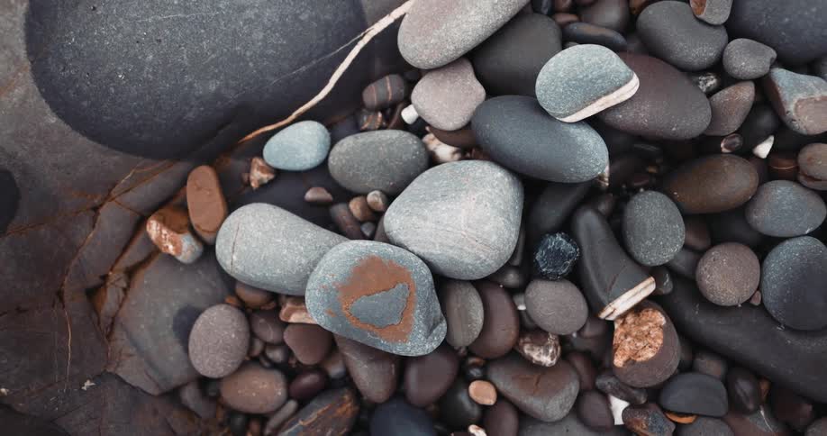 A pile of stones are on the ground