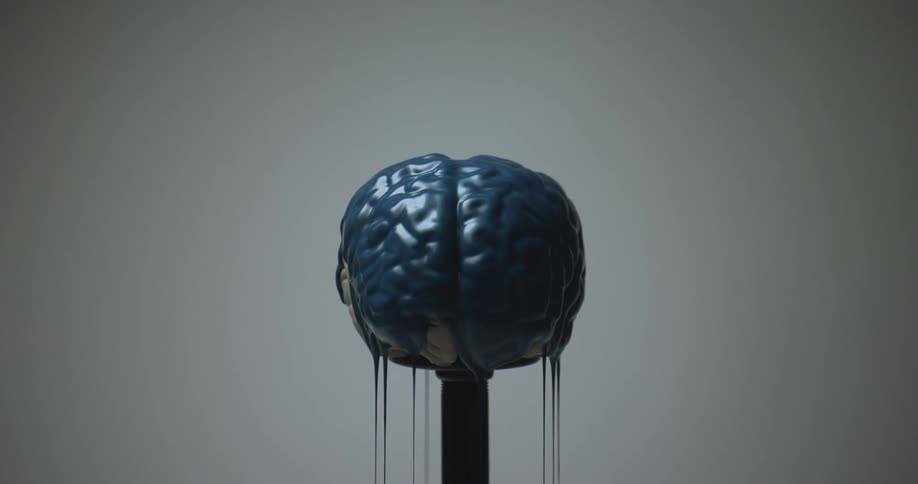 A view of a bain sculpture with paint on it