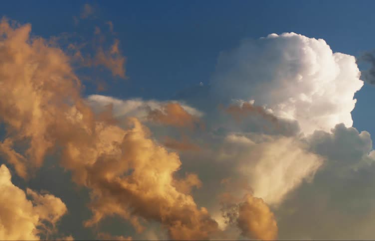 Dark clouds hanging in a blue sky