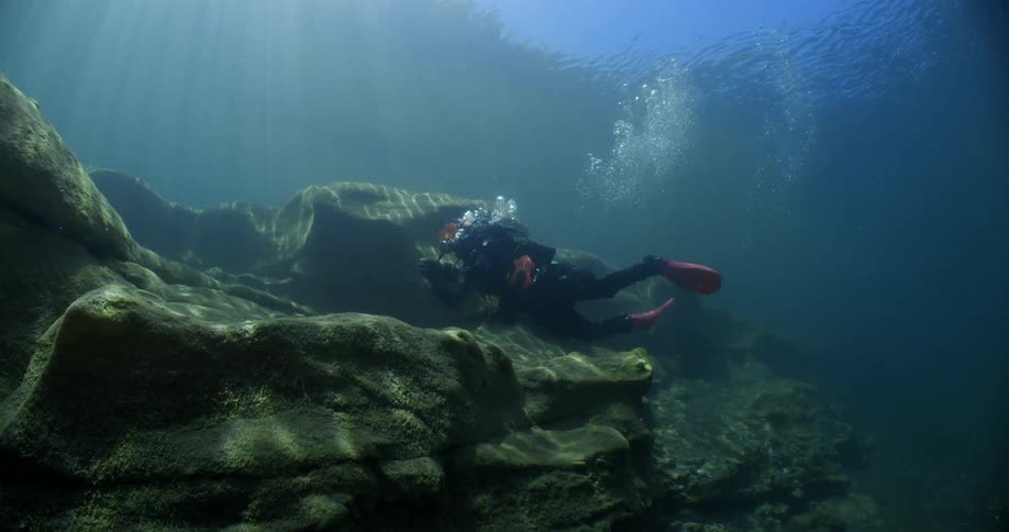 A person scuba diving outdoors