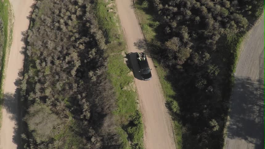 Aerial of a person driving a car