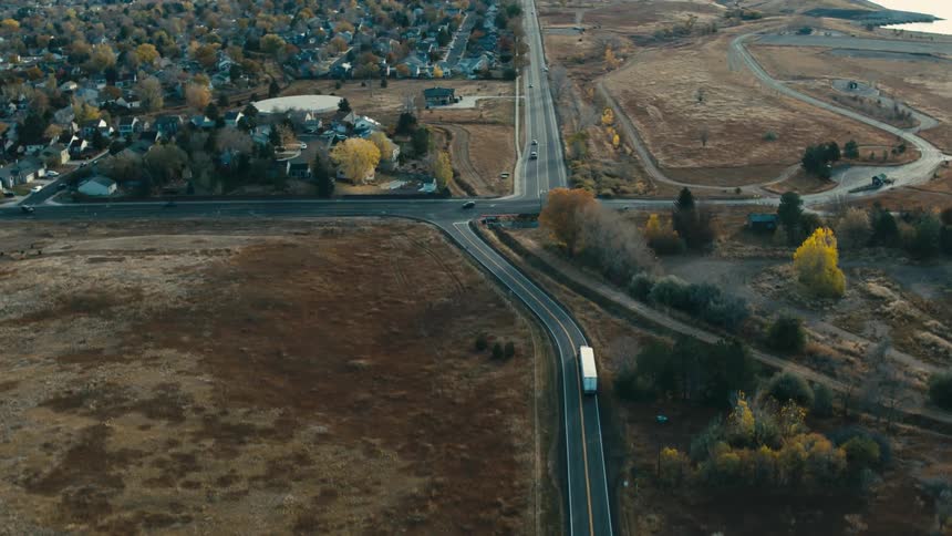 Vehicles drive on the highways around the town