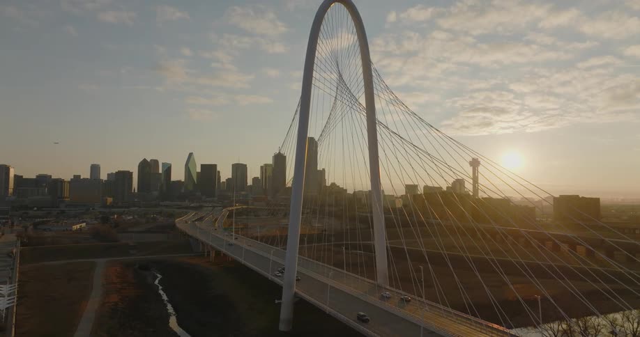 Cars travel across the margaret hunt hill bridge to and from dallas