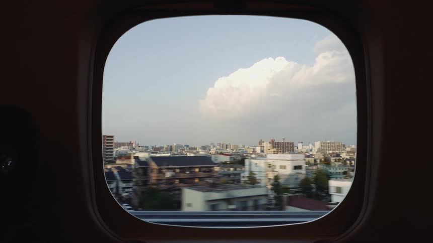 A view of a city from a train