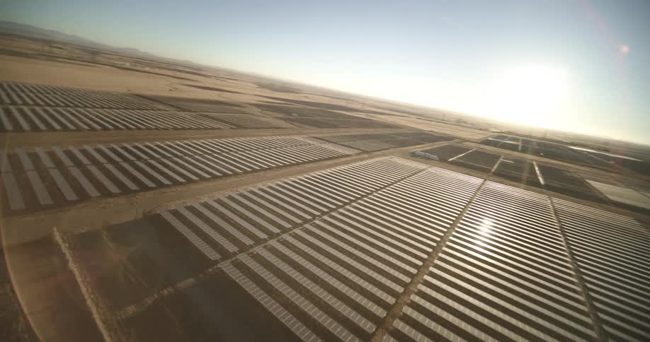 Aerial view of solar panels on field