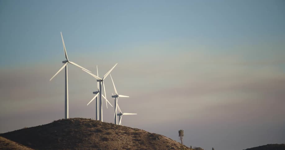 Windmills are spinning on the hills