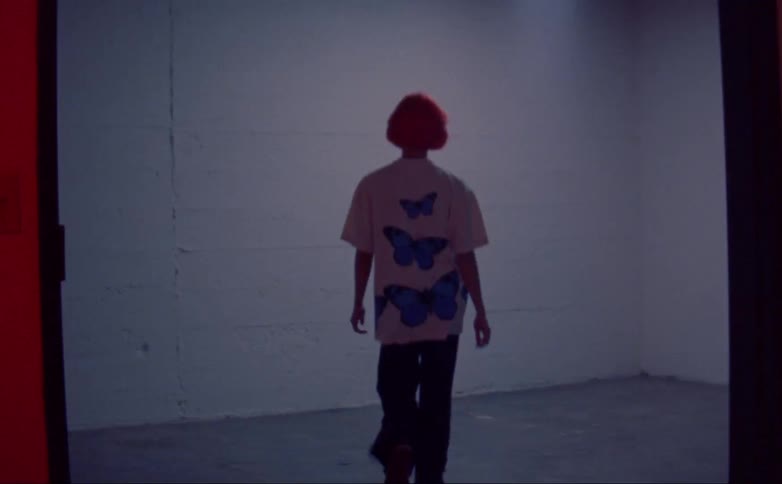 People walk around the room
