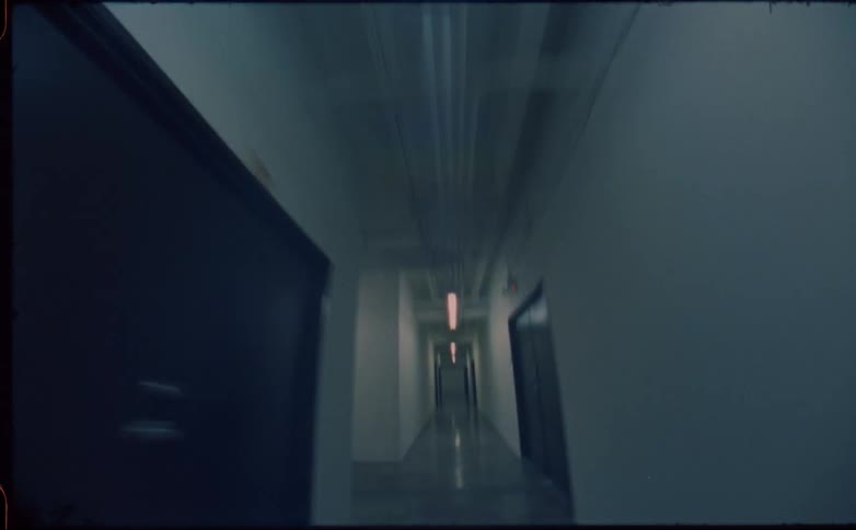 The lights flash in the dark hallway
