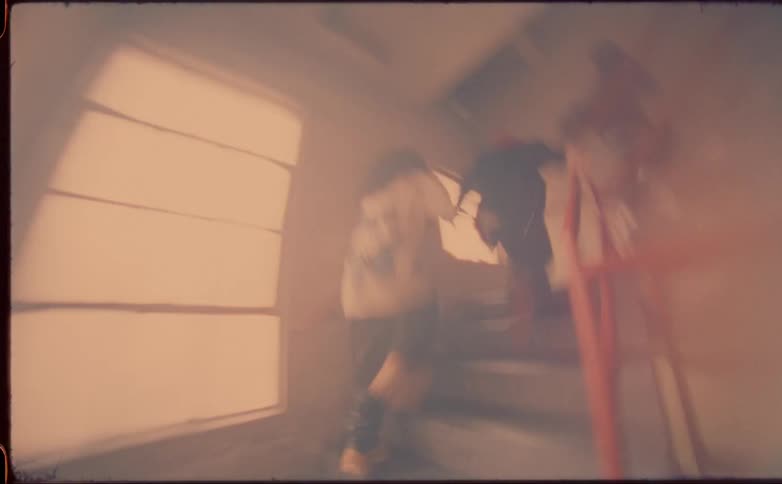 People race up the stairs in the building floor to floor