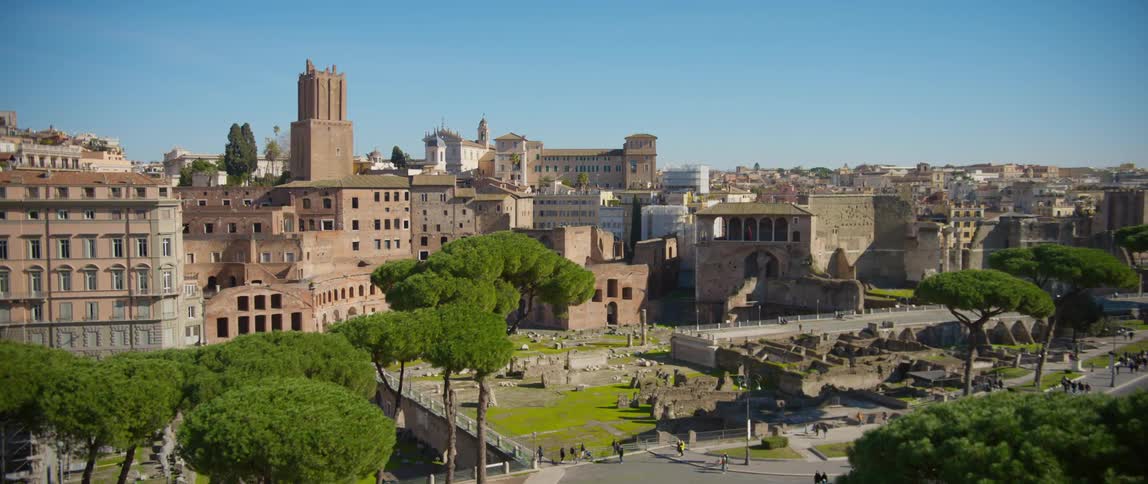 Tourists visiting the ruins of the roman forum plaza in the city of rome