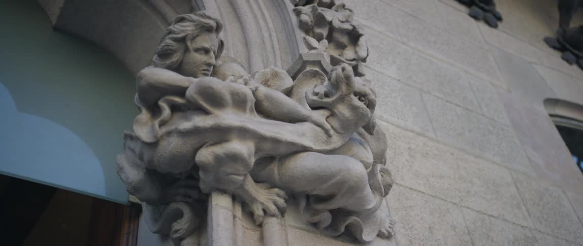A unique stone sculpture carving on an archway in Barcelona, Spain