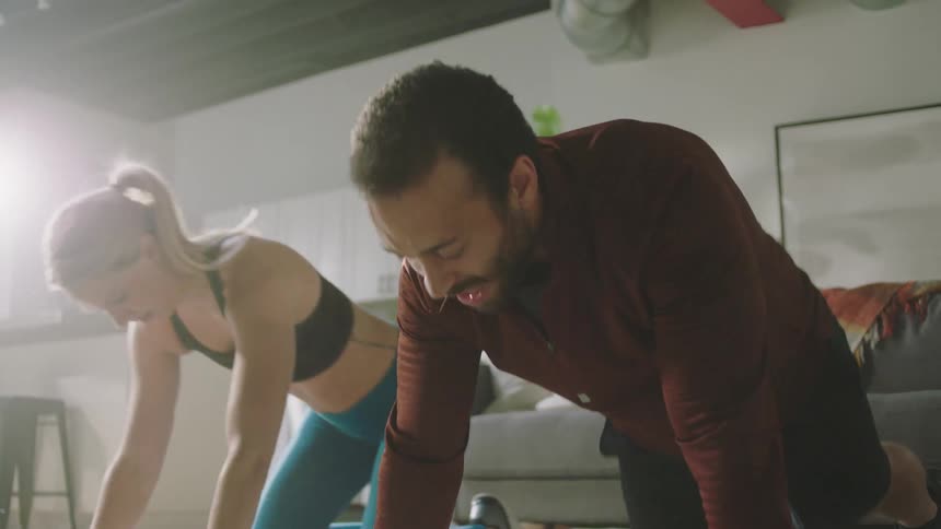 A man and woman exercising