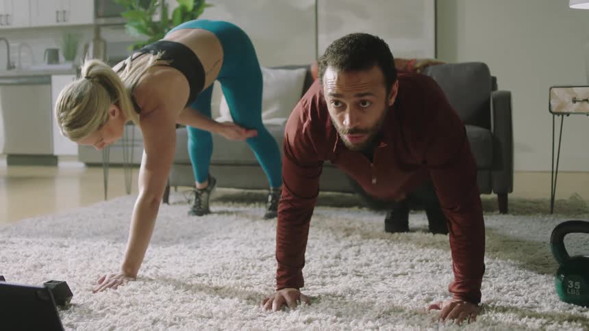 A man and woman working out together