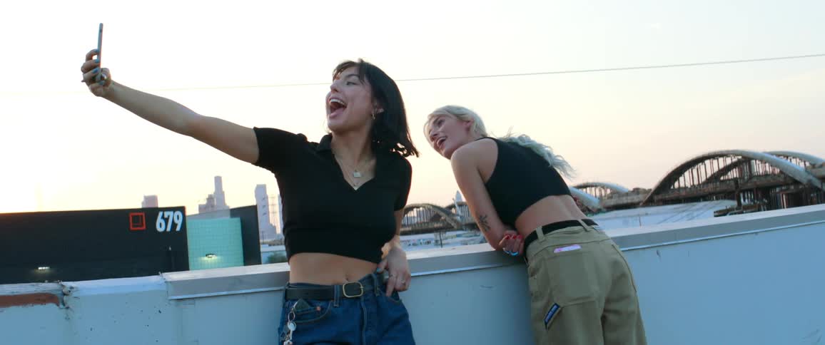 Two women take a selfie on the roof