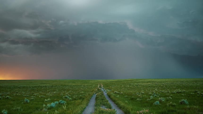 A large storm is raging in the distance