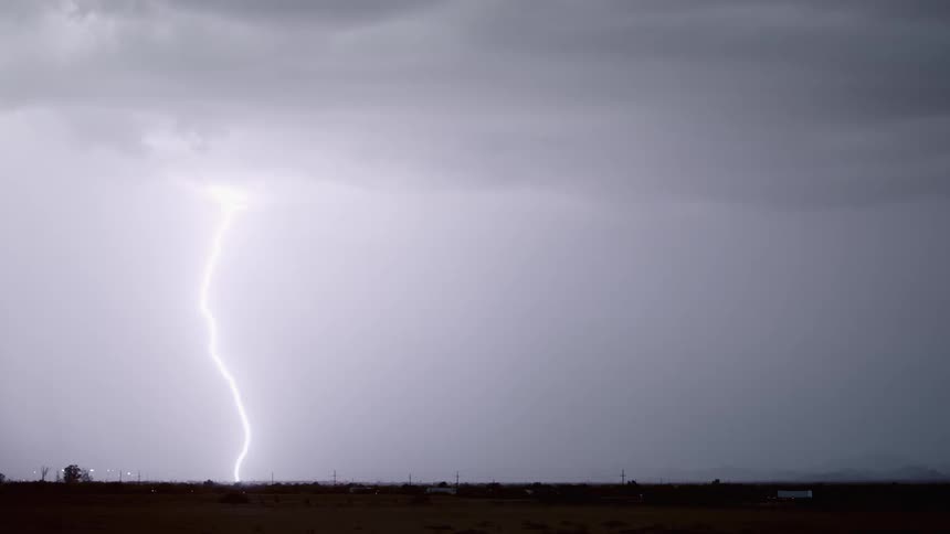 Lightning strike in the sky at night