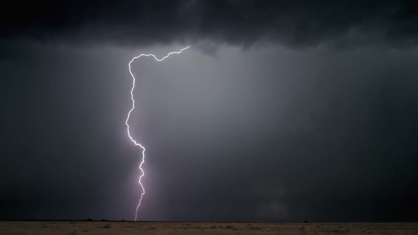 Lightning flashing in the sky during a rainstorm