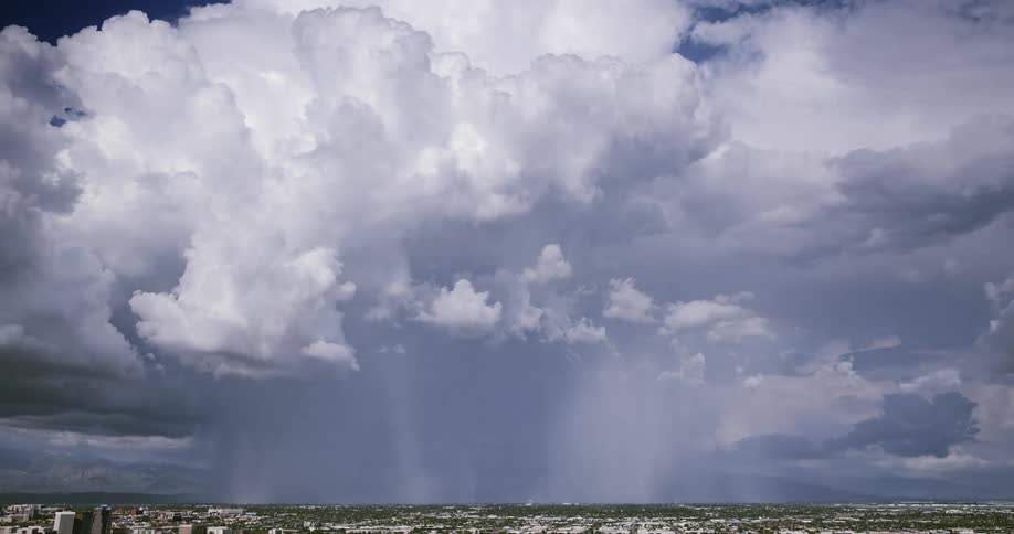 A tornado is forming in a landscape area in spring