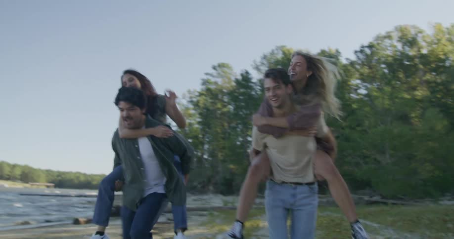 A group of friends are having fun at the beach in spring