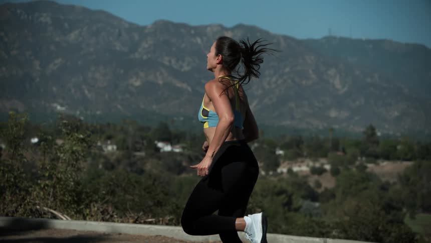 A woman running outdoors