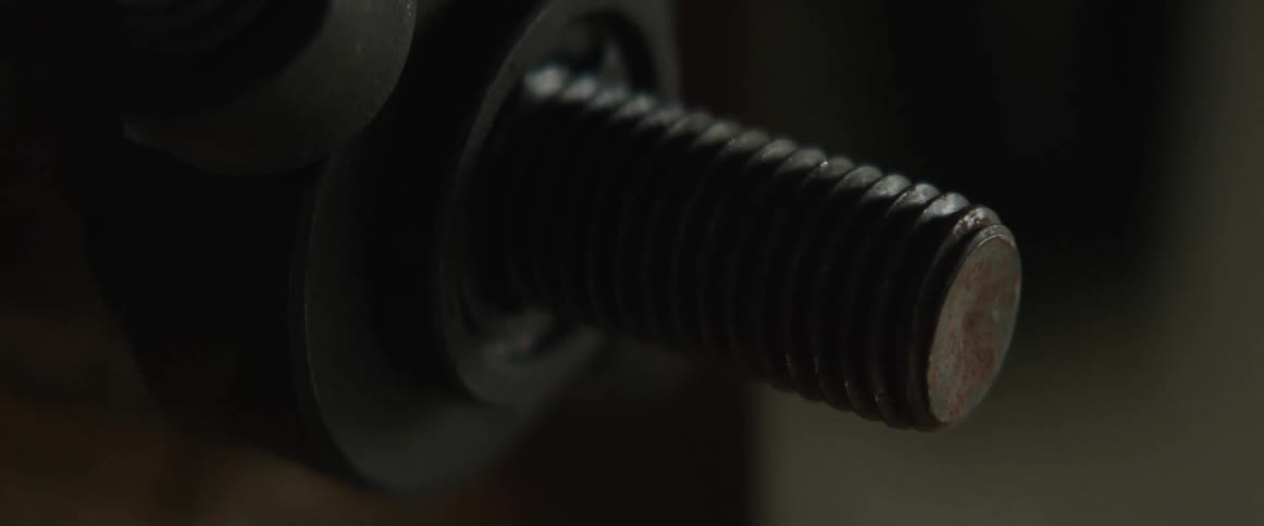 A metal washer and bolt