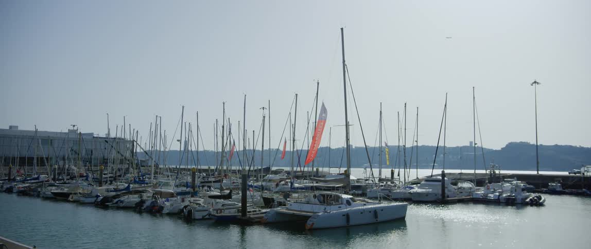 The dock is full of anchored boats