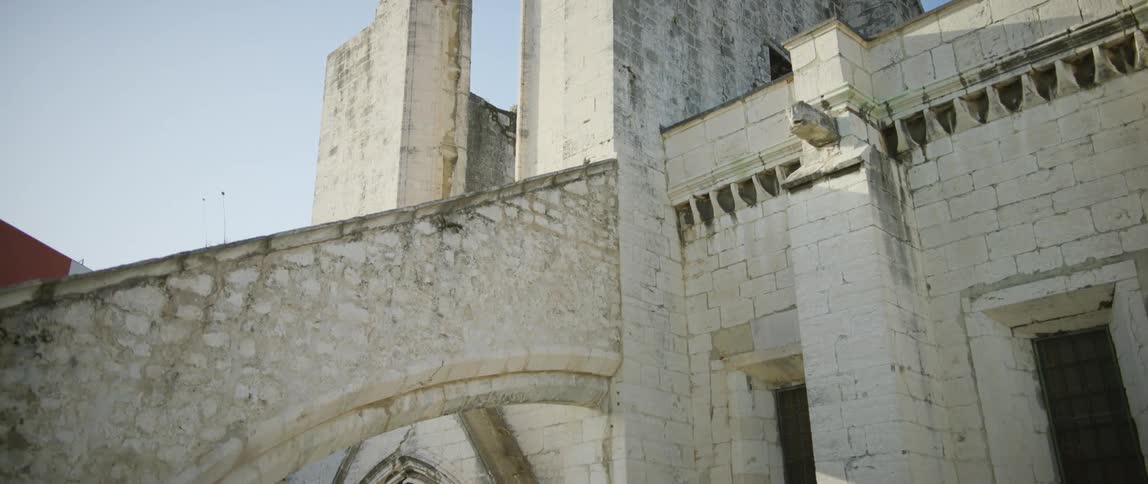 A close up view of a tall building is displayed