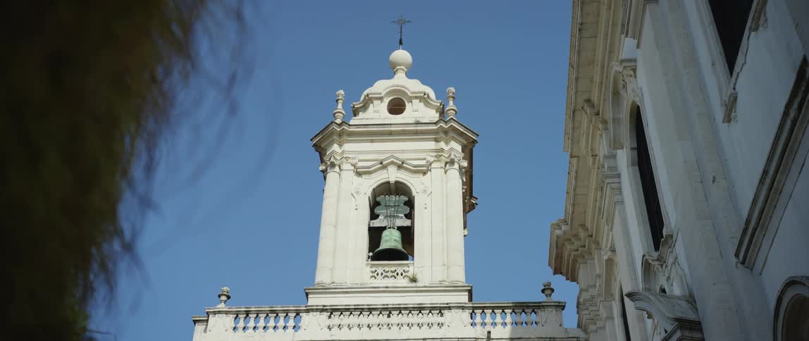 A building is displayed in a city during the daytime