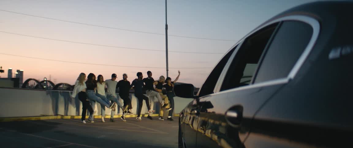 A group of people dance together