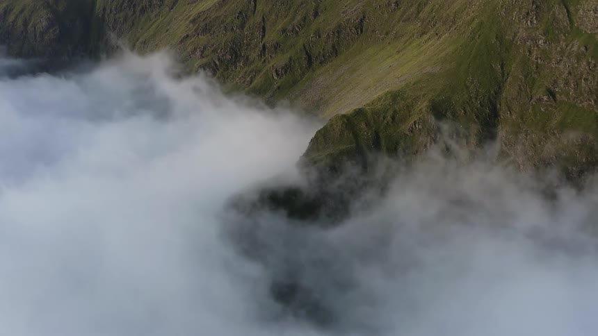 Clouds are covering the mountain tops in spring