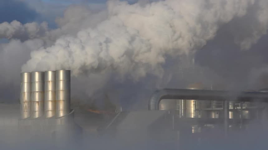 Smoke and pollution is coming from the power plant
