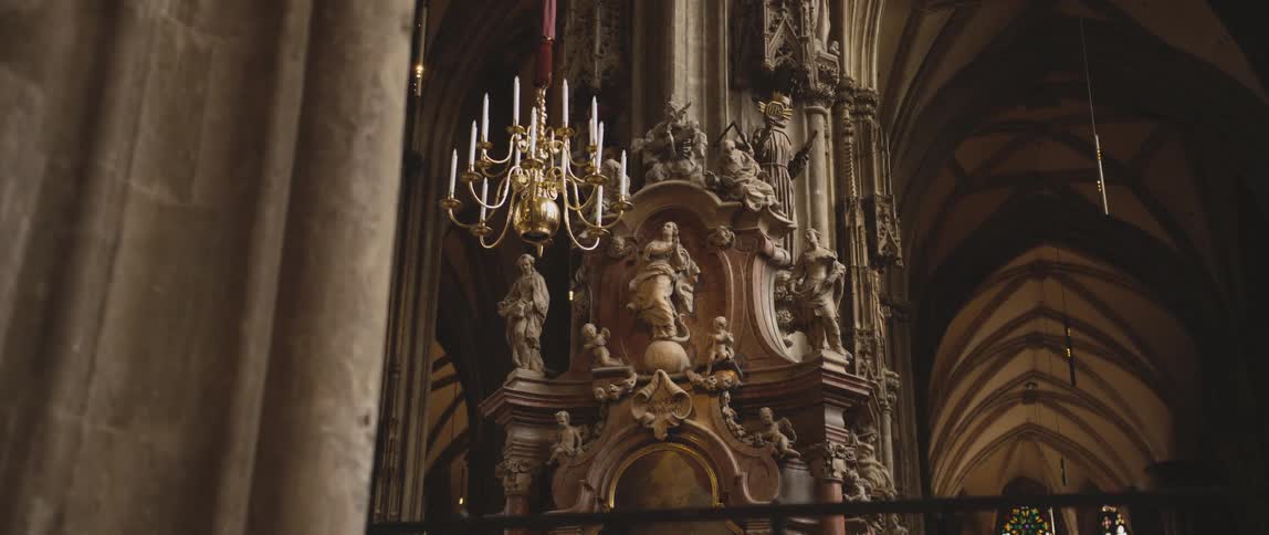 Sculptures on a pillar in a cathedral during the day