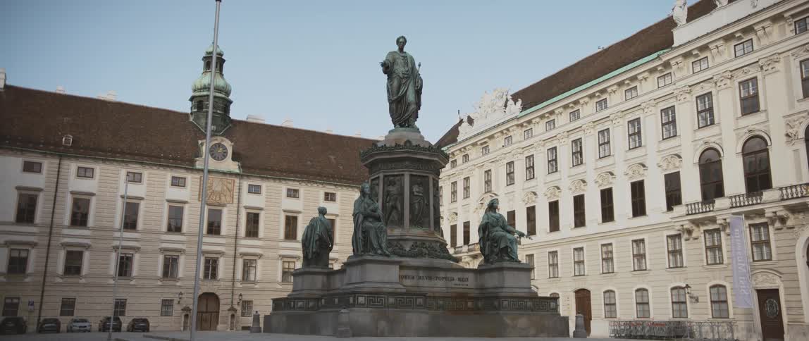 The statue of emperor francis i in front of the palace in vienna