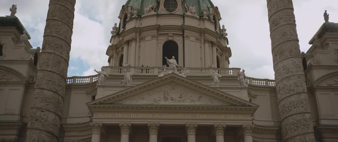 People walk towards the building