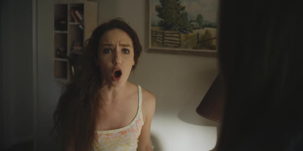 A teenage girl has an argument with a woman