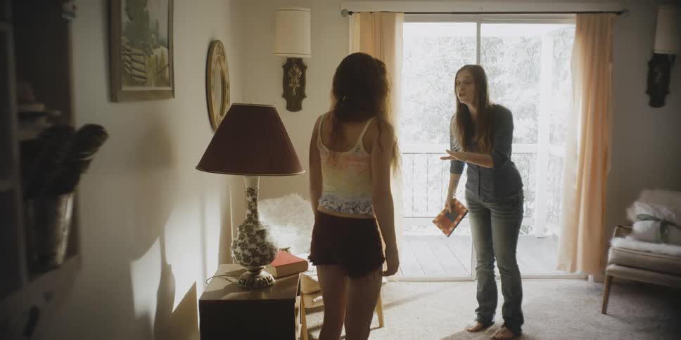 Two girls argue at home