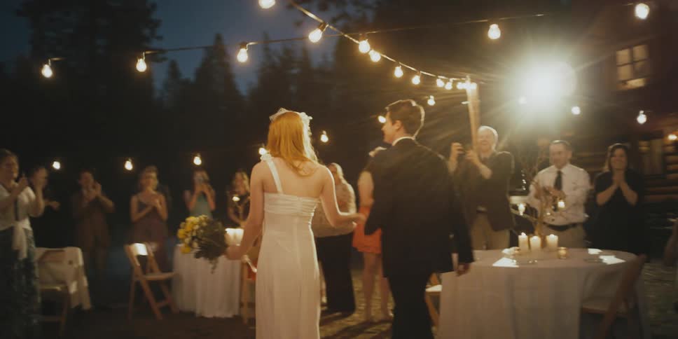 A bride and groom celebrate at their reception