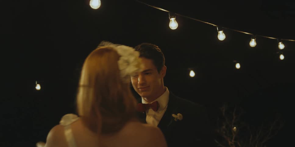 A bride and groom dance at their reception