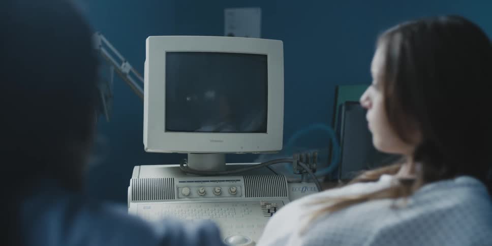 A woman is being examined in a hospital