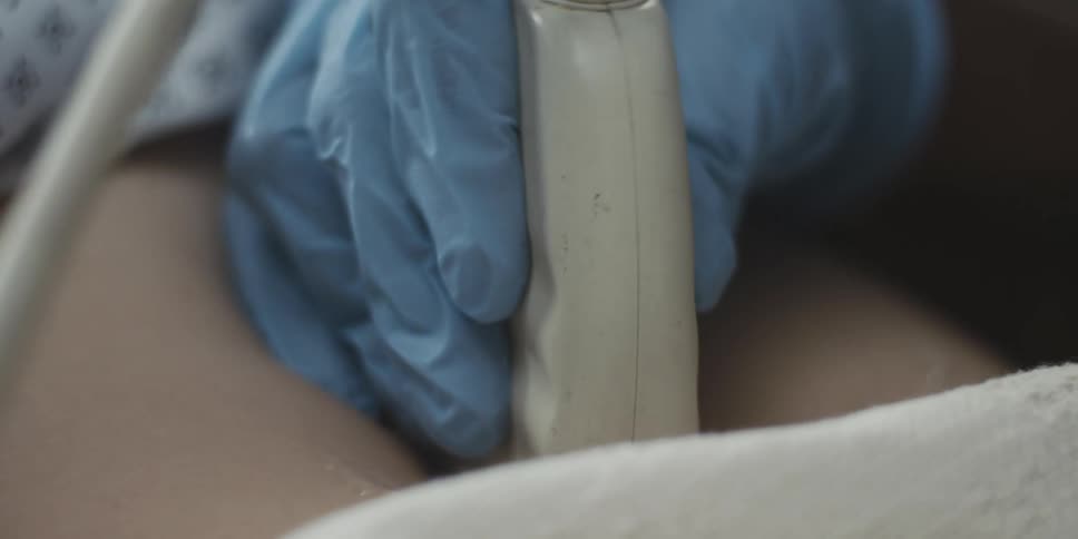 A pregnant woman gets a sonogram