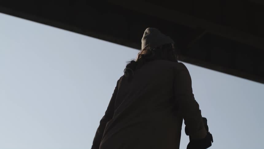 A woman walking around outdoors