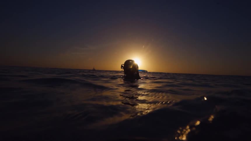 A person is snorkeling in the ocean